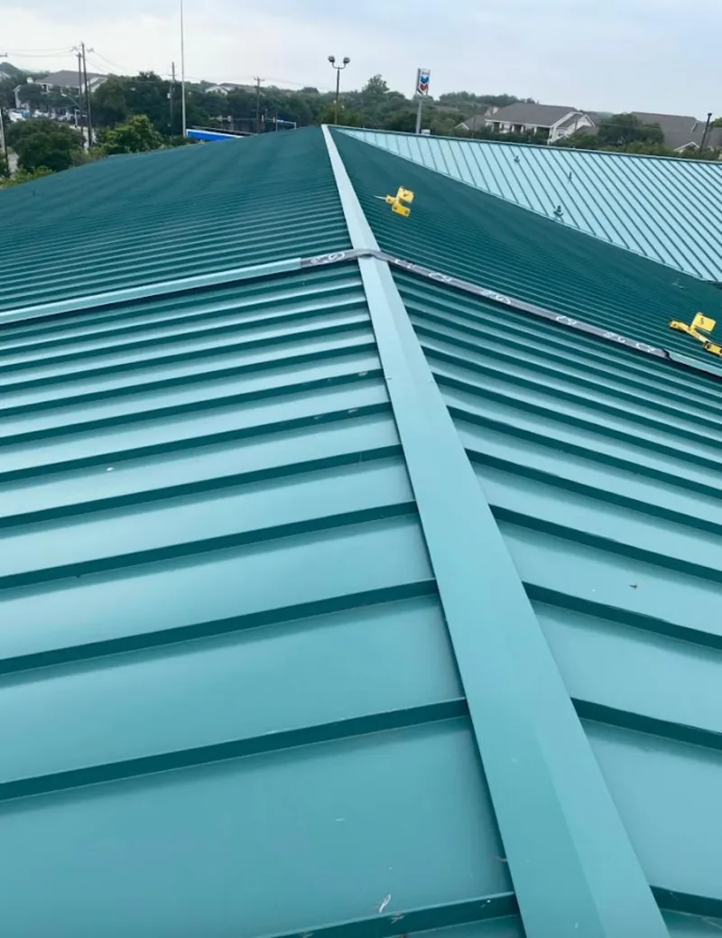 Green commercial metal roof ridge and valley for Metal Roof Repair in Denison